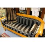 A 19th century Biedermeier style satin birch sofa,