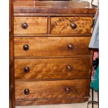 A Victorian birchwood chest of drawers, fitted with two short over three long graduated drawers,