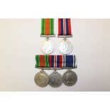 A Defence medal, with an exemplary Police medal and one other, an unnamed Defence medal,