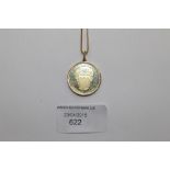 An 18ct .750 Bahrain gold pendant and chain, 14.7 grams approx