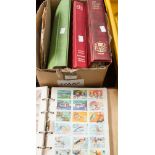 A worldwide accumulation of stamps in four albums, thousands to sort