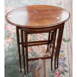 An Edwardian mahogany nest of three tables