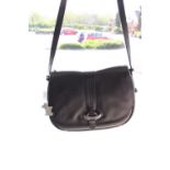 A Radley shoulder bag, black leather with grey trim; together with dog label,