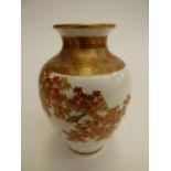 A late 19th century Meiji period squat vase of inverted baluster form,decorated with birds in