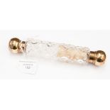 A Victorian silver gilt and cut glass double ended perfume bottle, Thornhill, New Bond Street,