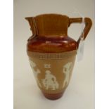 A Doulton Lambeth jug of Egyptian design (restorations)