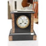 A Victorian black slate and marble eight day mantle clock, the white enamelled dial inscribed E