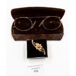**RE-OFFER 20/30**A 15ct  brooch and a pair of gold rimmed spectacles (2)