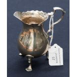A late Victorian silver cream jug, in the George II style, London 1895, 2.9 ozt
