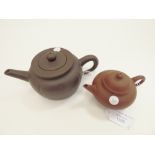 Two Yixing teapots