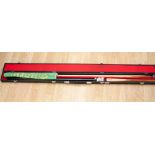 A Titan snooker/pool cue in box with two ends/three pieces