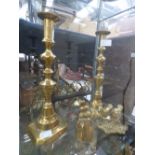 A pair of late 19th Century brass candlesticks; together with brass bell and brass bird sculptor