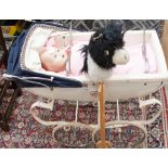 A 1970s silver cross doll's pram (handle loose); together with a 1950s plastic doll and a hobby