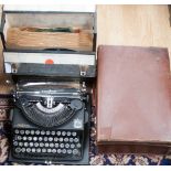 A 1940s portable imperial typewriter, two suitcases and a case of records (4)