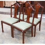 Four reproduction dining chairs