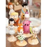 **REOFFER IN MAY £150 - £200** A boxed set of seven Beswick Flintstones figures,