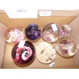Seven glass paperweights (7)