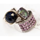 A 9ct white gold and sapphire ring; two silver gem set rings (3)