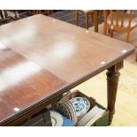 A 19th century mahogany extending dining table, complete with three removable leaves,