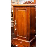 A Victorian pedestal pot cupboard, fitted with a single door