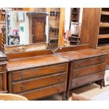 A Jacobean style oak part bedroom suite, comprising dressing chest and bedroom chest (2)