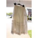 Two Victorian/Edwardian and one white cotton underskirts (3)