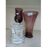 Two amethyst glass vases, circa 1960s and a ceramic musical carousel with certificate (3)