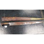 Middle Eastern sword with leather sheath, rusted.