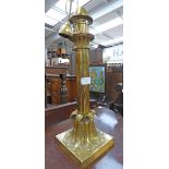 A Victorian cast brass Palmer and Co patent table lamp, telescopic, the base cast with foliate