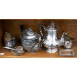 A three piece tea service EPBM, silver plated teapot, silver frame, EPNS napkin ring and pierced
