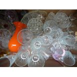 A collection of various glassware, including drinking glasses, vases, bowls, cut glass, etc
