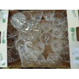 A box of cut glass wine glasses and decanter