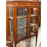 An Edwardian mahogany and inlaid display cabinet,