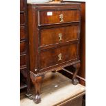 A 1920s Georgian style mahogany three drawer bedside chest