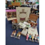 A box of collectables including chix trade cards and cigarette cards in albums, boxed playing