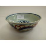 A small oriental bowl, hairlines to interior,