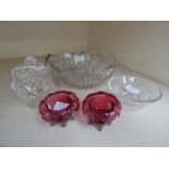 A pair of Victorian Cranberry salts, a cut glass preserve pot and cover, a salad crystal bowl and a