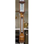 A Victorian Negretti and Zamra oak stick barometer, number 365