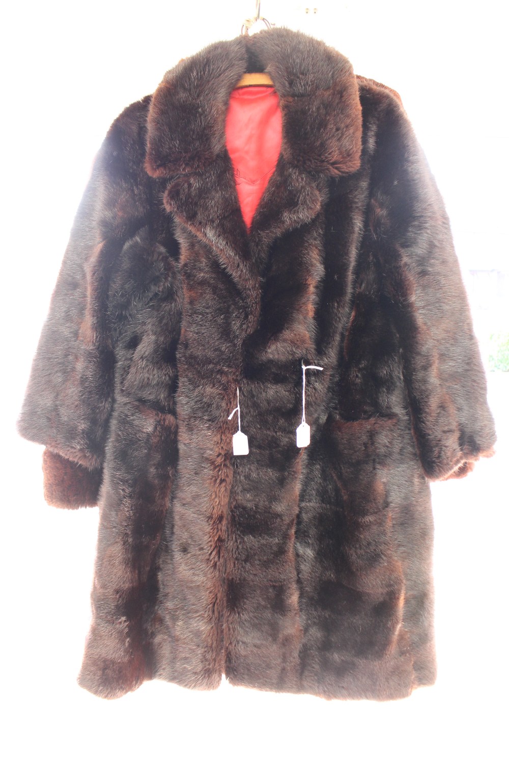 A calf skin fur coat 1960s and some wear down front and a Cony fur 1960s coat and a Marmot fur coat,