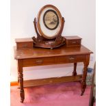 A late Victorian mahogany dressing table, fitted with two short drawers with two further drawers to