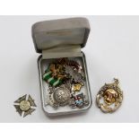 A small box containing some silver medals (3 ozt approx)