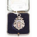 ***WITHDRAWN CLIENT COLLECTED*** A silver and enamel Derbyshire FA medallion, engraved 'For Loyalty