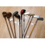 Nine modern and vintage golf clubs including irons, metal and hickory shafts, one stamped 'J.