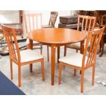 A contemporary dining table and four solid beech chairs (5)