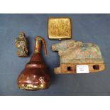 A carved wooden circa 18th Century temple horse, with a bronze Buddah, a brass cigarette case and a