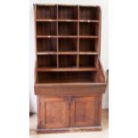 A Victorian pitch pine postal sorting cabinet,