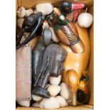 A box of assorted treen items, including native art, sculpture, etc