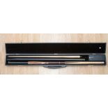 A Buxton cue craft pool/snooker cue in case, with various extensions, four pieces