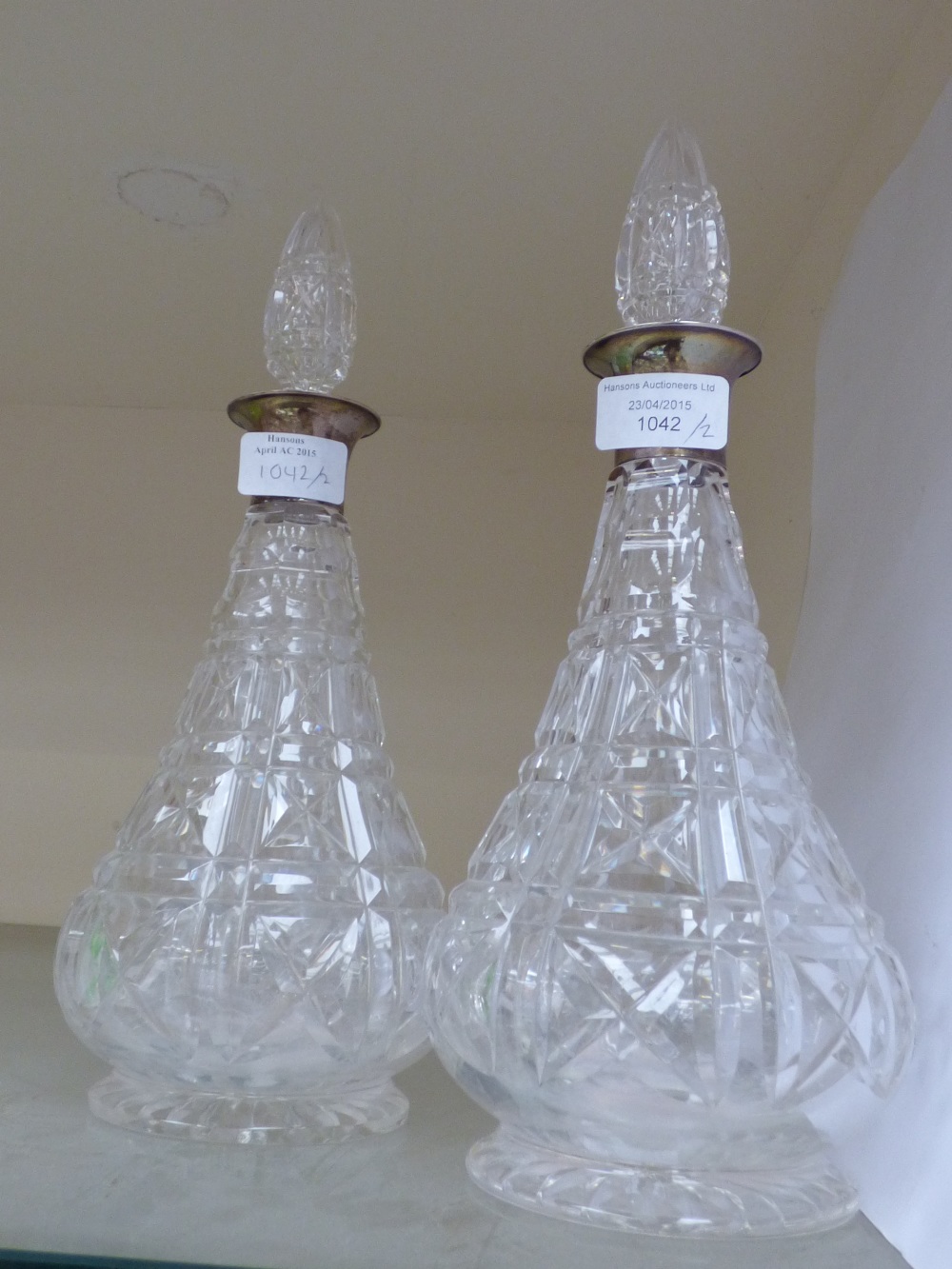 A pair of John Walsh decanters with silver collars, Kenilworth pattern, Mappin & Webb,