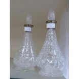 A pair of John Walsh decanters with silver collars, Kenilworth pattern, Mappin & Webb,